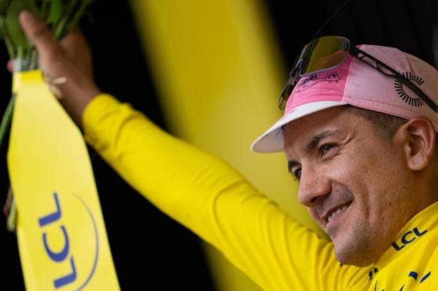 Ecuador s Richard Carapaz, wearing the overall leader s yellow jersey, reacts on the podium of the third the third stage of the Tour de France cycling race over 230.8 kilometers (143.4 miles) with start in Piacenza and finish in Turin, Italy, Monday, July 01 2024. - cycling .  Copyright: xMarcoxAlpozzi LaPressex