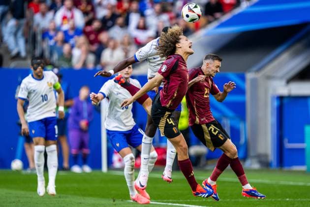 240701 Wout Faes and Timothy Castagne of Belgium and Marcus Thuram of France during the UEFA Euro 2024 Football Championship round of 16 match between France and Belgium on July 1, 2024 in Dusseldorf Photo Mathias Bergeld BILDBYRAN kod MB MB0941 fotboll football soccer fotballs em europamästerskap em uefa euro uefa european football championship euro 2024 frankrike france belgien belgium bbeng round of 16 attondelsfinal  Copyright: MATHIASxBERGELD BB240701MB047