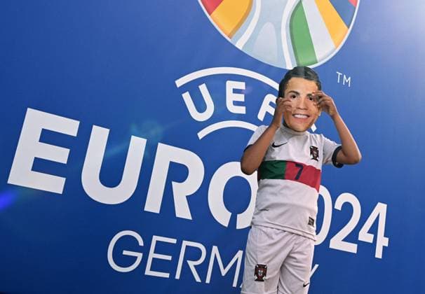Germany Soccer Euro 2024 Portugal - Slovenia 8720641 01.07.2024 A Portugal s fan wearing a mask depicting Portugal s player Cristiano Ronaldo cheers before the UEFA EURO, EM, Europameisterschaft,Fussball 2024 round of 16 soccer match between Portugal and Slovenia outside the Frankfurt Arena in Frankfurt am Main, Germany. Alexey Filippov Sputnik Germany  Copyright: xAlexeyxFilippovx