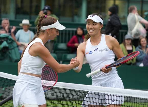 Lawn Tennis - 2024 Wimbledon Championship - Tamara Korpatsch (GER) Yuriko Lily Miyazaki (GBR) - All England Lawn Tennis & Croquet Club - Monday 1st July 2024 Yuriko Lily Miyazaki (GBR) shakes hands after the match 