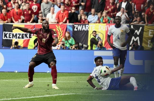 Belgium s Romelu Lukaku and France s Aurelien Tchouameni pictured in action during a soccer game between France and Belgian national soccer team Red Devils, Monday 01 July 2024 in Dusseldorf, Germany, the Round of 16 game in the UEFA EURO, EM, Europameisterschaft,Fussball 2024 European championships. BRUNOxFAHY  x95648853x