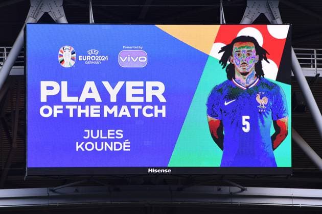 Soccer UEFA EURO 2024 Round of 16 France Belgium on 01 07 2024 at Düsseldorf Arena in Düsseldorf Scoreboard Video wall Player of the match Jules Kounde France xRx