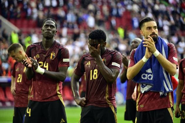 Belgium s Amadou Onana, Belgium s Orel Mangala and Belgium s Yannick Carrasco look dejected after a soccer game between France and Belgian national soccer team Red Devils, Monday 01 July 2024 in Dusseldorf, Germany, the Round of 16 game in the UEFA EURO, EM, Europameisterschaft,Fussball 2024 European championships. DIRKxWAEM  x95652809x