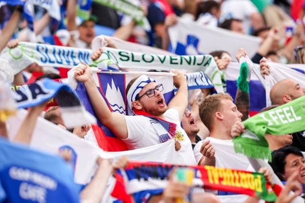2024-07-01 Portugal v Slovenia - Round of 16 - UEFA EURO, EM, Europameisterschaft,Fussball 2024 FRANKFURT, GERMANY - JULY 1: Fan of Slovenia holding up scarves during the Round of 16 - UEFA EURO 2024 match between Portugal and Slovenia at Deutsche Bank Park on July 1, 2024 in Frankfurt, Germany. (Photo by Peter Lous BSR Agency) Frankfurt Germany Content not available for redistribution in The Netherlands directly or indirectly through any third parties. Copyright: xBSRxAgencyx