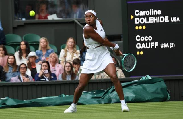 American Coco Gruff plays a backhand in her first round match against American Carloline Dolehide on day one of the 2024 Wimbledon Championships in London on Monday, July 01, 2024.  LON2024070177 HUGOxPHILPOTT
