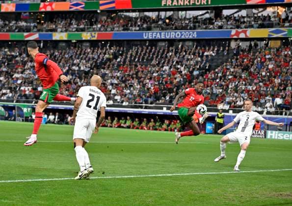 01 07 2024, Football UEFA EURO 2024, Round of 16, Portugal Slovenia, at Frankfurt Arena Frankfurt am Main, Rafael Leao Portugal vs Zan Karnicnik Slovenia v l Cristiano Ronaldo Portugal , Vanja Drkusic Slovenia , Rafael Leao Portugal and Zan Karnicnik Slovenia