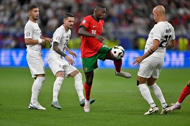 01 07 2024, Football UEFA EURO 2024, Round of 16, Portugal Slovenia, in the Frankfurt Arena Frankfurt am Main, Nuno Mendes Portugal vs Vanja Drkusic Slovenia
