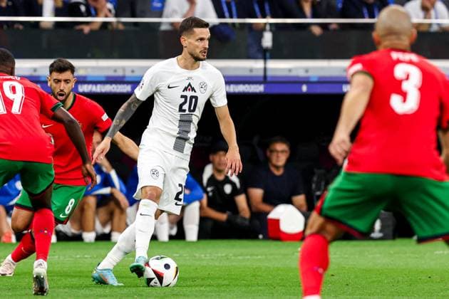 2024-07-01 Portugal v Slovenia - Round of 16 - UEFA EURO, EM, Europameisterschaft,Fussball 2024 FRANKFURT, GERMANY - JULY 1: Petar Stojanovic of Slovenia runs with the ball during the Round of 16 - UEFA EURO 2024 match between Portugal and Slovenia at Deutsche Bank Park on July 1, 2024 in Frankfurt, Germany. (Photo by Peter Lous BSR Agency) Frankfurt Germany Content not available for redistribution in The Netherlands directly or indirectly through any third parties. Copyright: xBSRxAgencyx
