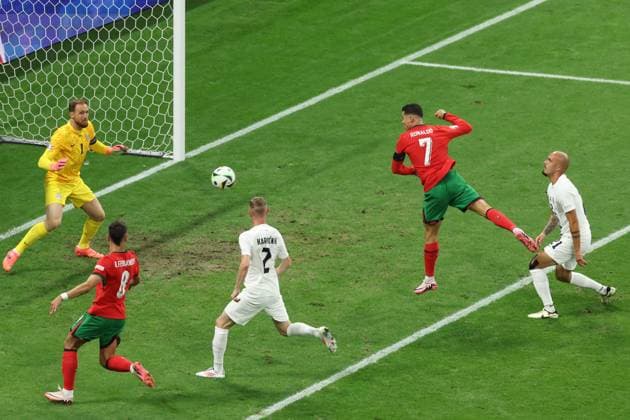Cristiano Ronaldo of Portugal stretches but fails to meet the cross Portugal v Slovenia, UEFA European Championship, EM, Europameisterschaft 2024, Round of 16, Football, Frankfurt Arena, Frankfurt, Germany - 01 Jul 2024 EDITORIAL USE ONLY No use with unauthorised audio, video, data, fixture lists, club league logos or live services. Online in-match use limited to 120 images, no video emulation. No use in betting, games or single club league player publications. Copyright: xPaulxCurrie Shutterstockx 14566636ag
