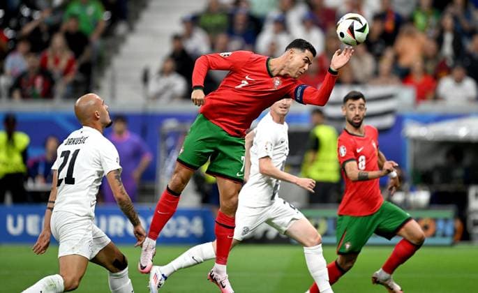 Football Euro 2024 Round of 16 01 07 2024 Portugal Slovenia Vanja Drkusic left, Slovenia Cristiano Ronaldo right, Portugal
