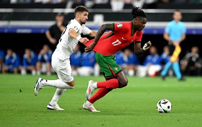 Football Euro 2024 Round of 16 01 07 2024 Portugal Slovenia David Brekalo left, Slovenia v Rafael Leao right, Portugal