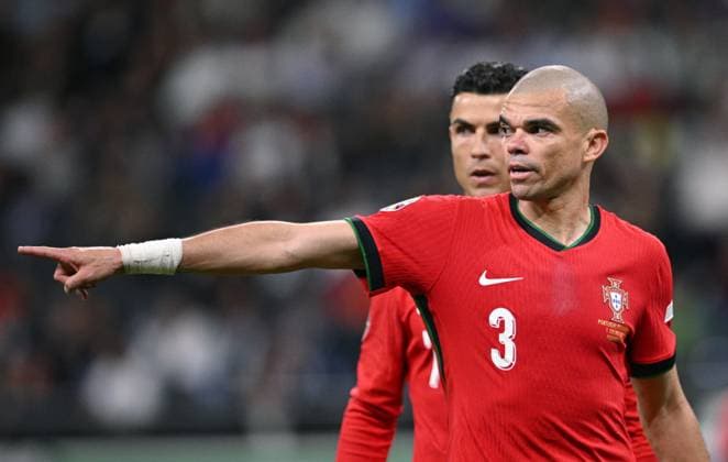 Germany Soccer Euro 2024 Portugal - Slovenia 8720750 01.07.2024 Portugal s Cristiano Ronaldo, left, and Pepe are seen during the UEFA EURO, EM, Europameisterschaft,Fussball 2024 round of 16 soccer match between Portugal and Slovenia at the Frankfurt Arena in Frankfurt am Main, Germany. Alexey Filippov Sputnik Germany  Copyright: xAlexeyxFilippovx