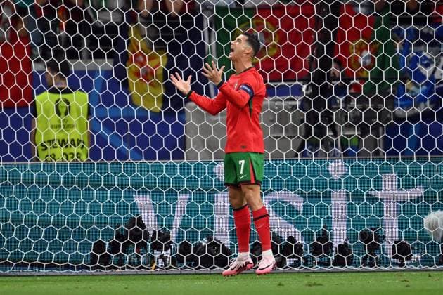 010724 KAI SCHWOERER Cristiano Ronaldo of Portugal reacts after missing a chance during the UEFA EURO, EM, Europameisterschaft,Fussball 2024 round of 16 match between Portugal and Slovenia at Frankfurt Arena on July 1, 2024 in Frankfurt, Germany. 010724-CPL-PORvSVN-004