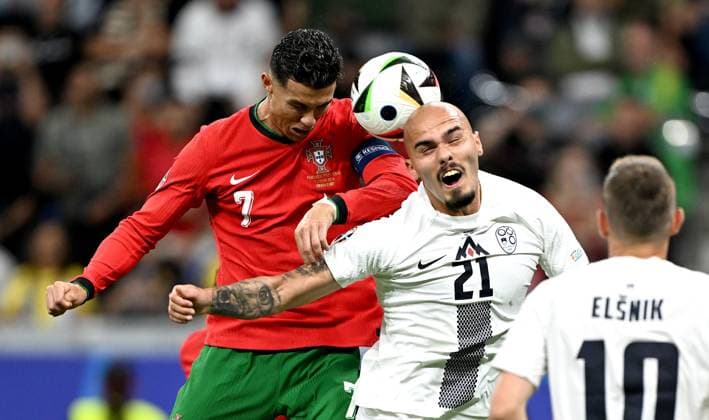 Football Euro 2024 Round of 16 01 07 2024 Portugal Slovenia Cristiano Ronaldo left, Portugal v Vanja Drkusic right, Slovenia