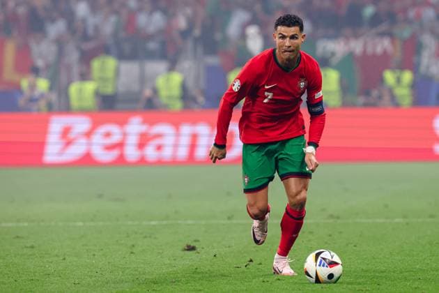 2024-07-01 Portugal v Slovenia - Round of 16 - UEFA EURO, EM, Europameisterschaft,Fussball 2024 FRANKFURT, GERMANY - JULY 1: Cristiano Ronaldo of Portugal runs with the ball during the Round of 16 - UEFA EURO 2024 match between Portugal and Slovenia at Deutsche Bank Park on July 1, 2024 in Frankfurt, Germany. (Photo by Peter Lous BSR Agency) Frankfurt Germany Content not available for redistribution in The Netherlands directly or indirectly through any third parties. Copyright: xBSRxAgencyx