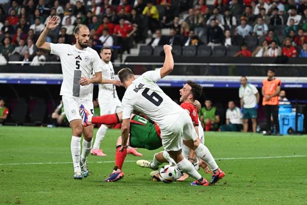 01 07 2024, xjhx, Football EM 2024 1 8 Final, Portugal Slovenia emspor, v l Foul by Vanja Drkusic Slovenia on Diogo Silva Portugal that led to the penalty kick that Cristiano Ronaldo Portugal missed UEFA REGULATIONS PROHIBIT ANY USE OF PHOTOGRAPHS as IMAGE SEQUENCES and or QUASI VIDEO Frankfurt am Main