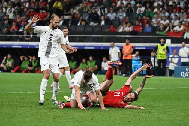 01 07 2024, xjhx, Football EM 2024 1 8 Final, Portugal Slovenia emspor, v l Foul by Vanja Drkusic Slovenia on Diogo Silva Portugal that led to the penalty kick that Cristiano Ronaldo Portugal missed UEFA REGULATIONS PROHIBIT ANY USE OF PHOTOGRAPHS as IMAGE SEQUENCES and or QUASI VIDEO Frankfurt am Main