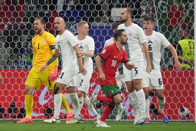 Goalkeeper Jan Oblak Slovenia, Slovenia, 01 cheers as he saves penalty Frankfurt 01 07 2024 Portugal vs Slovenia, EURO2024, M41 Round of 16, EM Arena Frankfurt
