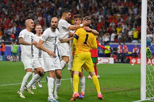 Collective celebration around goalkeeper Jan OBLAK SVN , jubilation,joy,enthusiasm, after penalty kick saved by Cristiano RONALDO POR Round of 16 Portugal POR Slovenia SVN 3 0 i E on 01 07 2024, Frankfurt Arena Football UEFA EURO 2024 GERMANY from 14 06 2024 14 07 2024 Â
