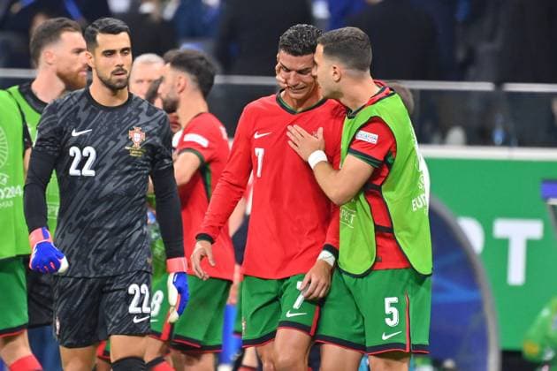 Cristiano RONALDO POR , crying after missing a penalty and before the start of extra time, is consoled by Diogo DALOT POR consolation Li goalkeeper DIOGO COSTA POR Round of 16 Portugal POR Slovenia SVN 3 0 i E on 01 07 2024, Frankfurt Arena Football UEFA EURO 2024 GERMANY from 14 06 2024 14 07 2024