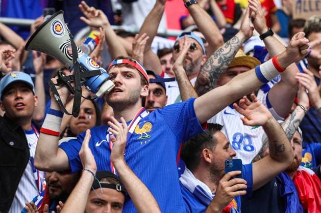 EM 2024 France Belgium on 01 07 2024 in the Arena Düsseldorf in Duesseldorf The fans from France, here a fan with megaphone MH