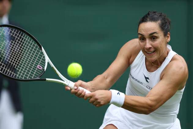 (240702) -- LONDON, July 2, 2024 -- Martina Trevisan hits a return during the women s singles first round match between Madison Keys of the United States and Martina Trevisan of Italy at Wimbledon tennis Championship in London, Britain, on July 1, 2024. ) (SP)BRITAIN-LONDON-TENNIS-WIMBLEDON HanxYan 