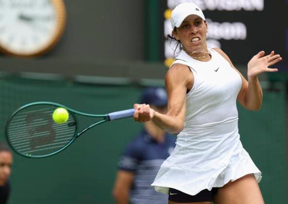 (240702) -- LONDON, July 2, 2024 -- Madison Keys hits a return during the women s singles first round match between Madison Keys of the United States and Martina Trevisan of Italy at Wimbledon tennis Championship in London, Britain, on July 1, 2024. ) (SP)BRITAIN-LONDON-TENNIS-WIMBLEDON HanxYan 