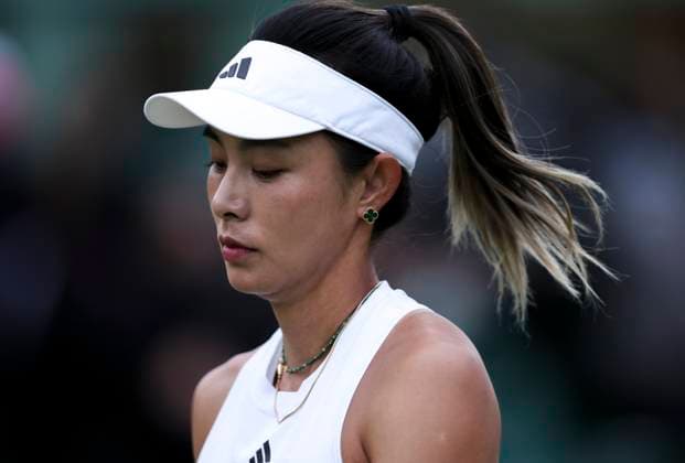 (240702) -- LONDON, July 2, 2024 -- Wang Qiang reacts during the women s singles first round match between Wang Qiang of China and Emma Navarro of the United States at Wimbledon tennis Championship in London, Britain, on July 1, 2024. ) (SP)BRITAIN-LONDON-TENNIS-WIMBLEDON HanxYan 