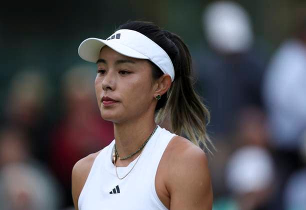 (240702) -- LONDON, July 2, 2024 -- Wang Qiang reacts during the women s singles first round match between Wang Qiang of China and Emma Navarro of the United States at Wimbledon tennis Championship in London, Britain, on July 1, 2024. ) (SP)BRITAIN-LONDON-TENNIS-WIMBLEDON HanxYan 