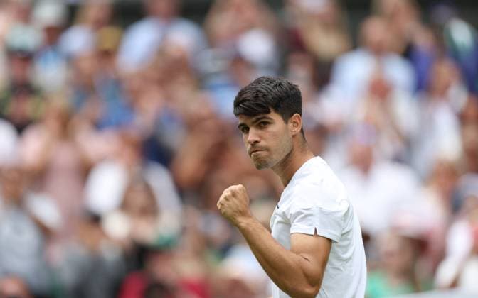 (240702) -- LONDON, July 2, 2024 -- Carlos Alcaraz reacts during the men s singles first round match between Carlos Alcaraz of Spain and Mark Lajal of Estonia at Wimbledon tennis Championship in London, Britain, on July 1, 2024. ) (SP)BRITAIN-LONDON-TENNIS-WIMBLEDON LixYing 