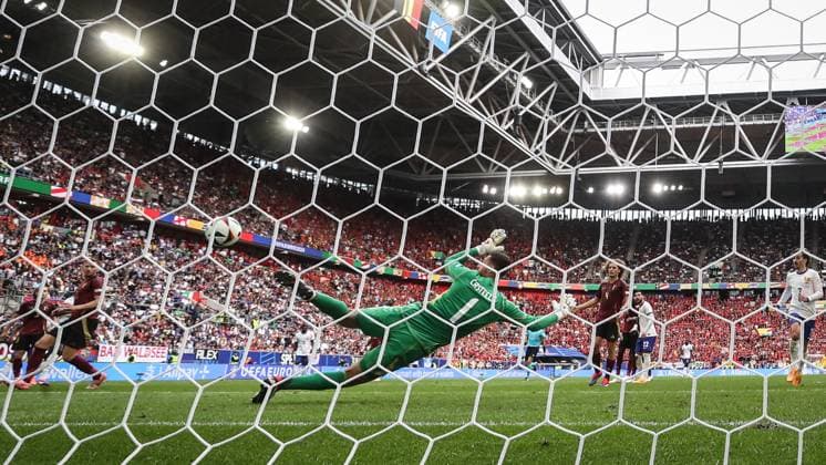 (240702) -- DUESSELDORF, July 2, 2024 -- Belgium s goalkeeper Koen Casteels (front) fails to save the own goal by Jan Vertonghen (2nd L) during the UEFA EURO, EM, Europameisterschaft,Fussball 2024 round of 16 match between France and Belgium in Duesseldorf, Germany on July 1, 2024. ) (SP)GERMANY-DUESSELDORF-FOOTBALL-EURO 2024-FRANCE VS BELGIUM PanxYulong 