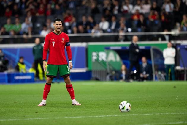 (240702) -- FRANKFURT, July 2, 2024 -- Cristiano Ronaldo of Portugal prepares before taking a penalty kick during the UEFA EURO, EM, Europameisterschaft,Fussball 2024 Round of 16 match between Portugal and Slovenia in Frankfurt, Germany on July 1, 2024. ) (SP)GERMANY-FRANKFURT-FOOTBALL-EURO 2024-PORTUGAL VS SLOVENIA XiaoxYijiu 