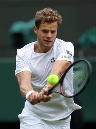 (240702) -- LONDON, July 2, 2024 -- Yannick Hanfmann hits a return during the men s singles first round match between Jannik Sinner of Italy and Yannick Hanfmann of Germany at Wimbledon tennis Championship in London, Britain, on July 1, 2024. ) (SP)BRITAIN-LONDON-TENNIS-WIMBLEDON HanxYan 