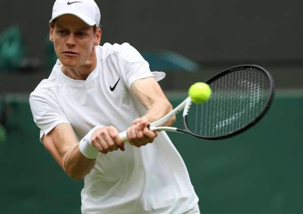 (240702) -- LONDON, July 2, 2024 -- Jannik Sinner hits a return during the men s singles first round match between Jannik Sinner of Italy and Yannick Hanfmann of Germany at Wimbledon tennis Championship in London, Britain, on July 1, 2024. ) (SP)BRITAIN-LONDON-TENNIS-WIMBLEDON HanxYan 