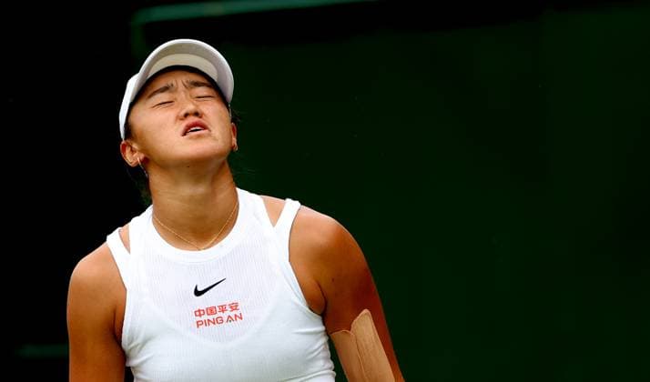 (240702) -- LONDON, July 2, 2024 -- Wang Xiyu reacts during the women s singles first round match between Wang Xiyu of China and Donna Vekic of Croatia at Wimbledon tennis Championship in London, Britain, on July 1, 2024. ) (SP)BRITAIN-LONDON-TENNIS-WIMBLEDON LixYing 