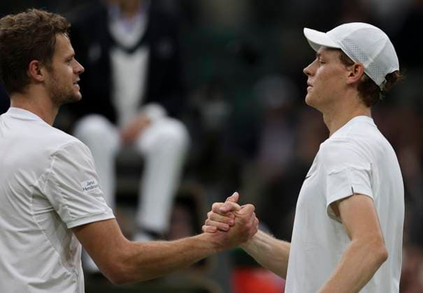 (240702) -- LONDON, July 2, 2024 -- Jannik Sinner (R) of Italy greets Yannick Hanfmann of Germany after their men s singles first round match at Wimbledon tennis Championship in London, Britain, on July 1, 2024. ) (SP)BRITAIN-LONDON-TENNIS-WIMBLEDON HanxYan 