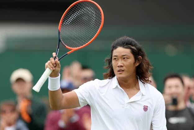 (240702) -- LONDON, July 2, 2024 -- Zhang Zhizhen greets spectators after winning the men s singles first round match between Zhang Zhizhen of China and Maxime Janvier of France at Wimbledon tennis Championship in London, Britain, on July 1, 2024. ) (SP)BRITAIN-LONDON-TENNIS-WIMBLEDON LixYing 