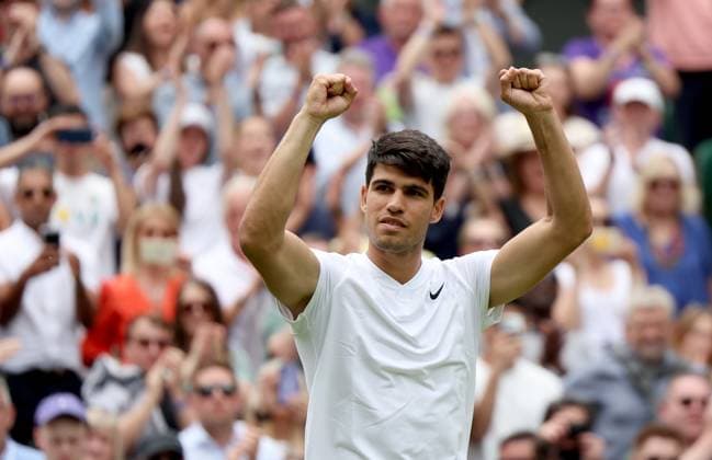 (240702) -- LONDON, July 2, 2024 -- Carlos Alcaraz celebrates after winning the men s singles first round match between Carlos Alcaraz of Spain and Mark Lajal of Estonia at Wimbledon tennis Championship in London, Britain, on July 1, 2024. ) (SP)BRITAIN-LONDON-TENNIS-WIMBLEDON LixYing 