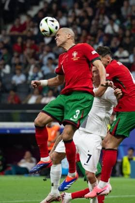 (240702) -- FRANKFURT, July 2, 2024 -- Pepe (L) of Portugal vies for a header during the UEFA EURO, EM, Europameisterschaft,Fussball 2024 Round of 16 match between Portugal and Slovenia in Frankfurt, Germany on July 1, 2024. ) (SP)GERMANY-FRANKFURT-FOOTBALL-EURO 2024-PORTUGAL VS SLOVENIA XiaoxYijiu 