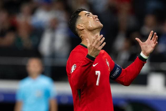 (240702) -- FRANKFURT, July 2, 2024 -- Cristiano Ronaldo of Portugal reacts after his penalty kick is saved by Slovenia s goalkeeper Jan Oblak during the UEFA EURO, EM, Europameisterschaft,Fussball 2024 Round of 16 match between Portugal and Slovenia in Frankfurt, Germany on July 1, 2024. ) (SP)GERMANY-FRANKFURT-FOOTBALL-EURO 2024-PORTUGAL VS SLOVENIA XiaoxYijiu 