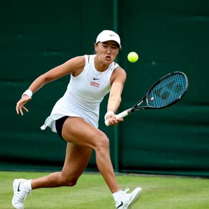 (240702) -- LONDON, July 2, 2024 -- Wang Xiyu hits a return during the women s singles first round match between Wang Xiyu of China and Donna Vekic of Croatia at Wimbledon tennis Championship in London, Britain, on July 1, 2024. ) (SP)BRITAIN-LONDON-TENNIS-WIMBLEDON LixYing 