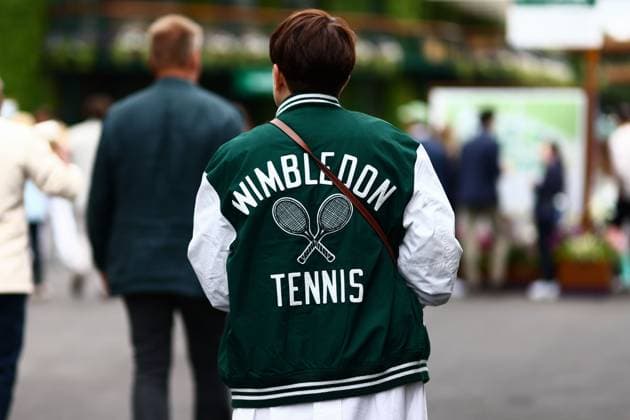 Spectator arrives on day two wearing a Wimbledon Tennis bomber jacket Wimbledon Tennis Championships, Day 2, The All England Lawn Tennis and Croquet Club, London, UK - 02 Jul 2024  Copyright: xJamesxMarsh Shutterstockx 14567680a