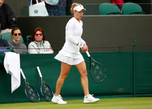 Laura Siegemund GER has two extra reserve racquets on the rail Copyright: xJuergenxHasenkopfx