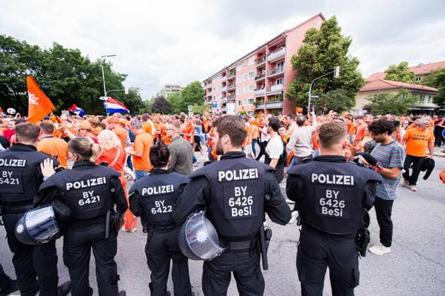 02 07 2024 Football, European Championship 2024 in Germany, fans in Munich Romania Netherlands The police in front of the Dutch fans before the game at the fan march near the Olympic Park