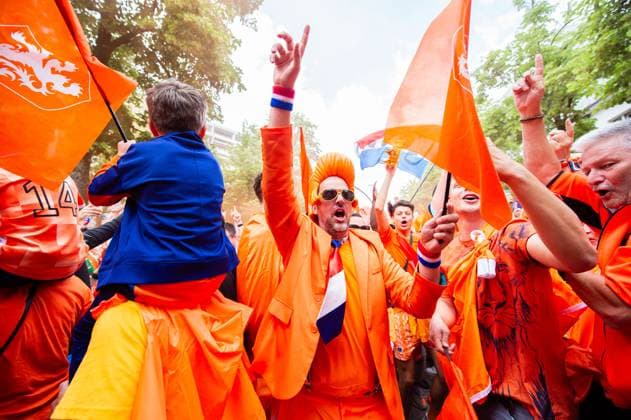 02 07 2024 Football, European Championship 2024 in Germany, fans in Munich Romania Netherlands Dutch fans before the match during the fan march near the Olympic Park In the picture they dance the song Left Right by Snollebollekes