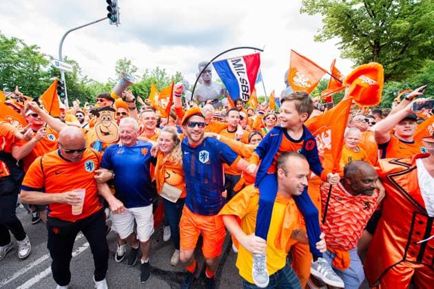 02 07 2024 Football, European Championship 2024 in Germany, fans in Munich Romania Netherlands Dutch fans before the match during the fan march near the Olympic Park In the picture they dance the song Left Right by Snollebollekes
