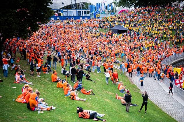 02 07 2024 Football, European Championship 2024 in Germany, fans in Munich Romania Netherlands Dutch and Romanian fans at the public viewing match in the Munich fan zone in front of the Olympic Tower