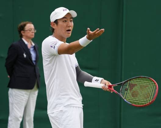 Lawn Tennis - 2024 Wimbledon Championship - Yoshihito Nishioka (JPN) v Nunu Borges (POR) - All England Lawn Tennis & Croquet Club - Tuesday 2nd July 2024 Yoshihito Nishioka (JPN) 