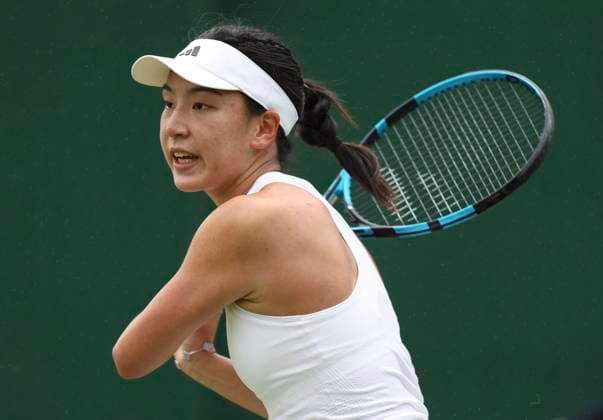 (240701) -- LONDON, July 1, 2024 -- Wang Xinyu hits a return during the women s singles first round match between Wang Xinyu of China and Viktoriya Tomova of Bulgaria at Wimbledon tennis Championship in London, Britain, on July 2, 2024. ) (SP)BRITAIN-LONDON-TENNIS-WIMBLEDON-DAY 2 HanxYan 