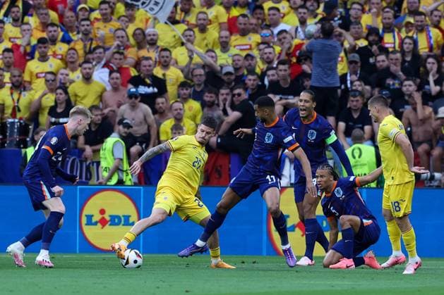 in duel, action, with Dennis Man 20 Romania , Cody Gakpo 11 Netherlands , Romania vs Netherlands, Football, UEFA Euro 2024, Round of 16, M43, 02 07 2024 Munich Bavaria Germany Copyright: xkolbert-press ChristianxKolbertx